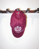 Maroon cap with Norwegian flag and crest, related to stamox beetroot powder