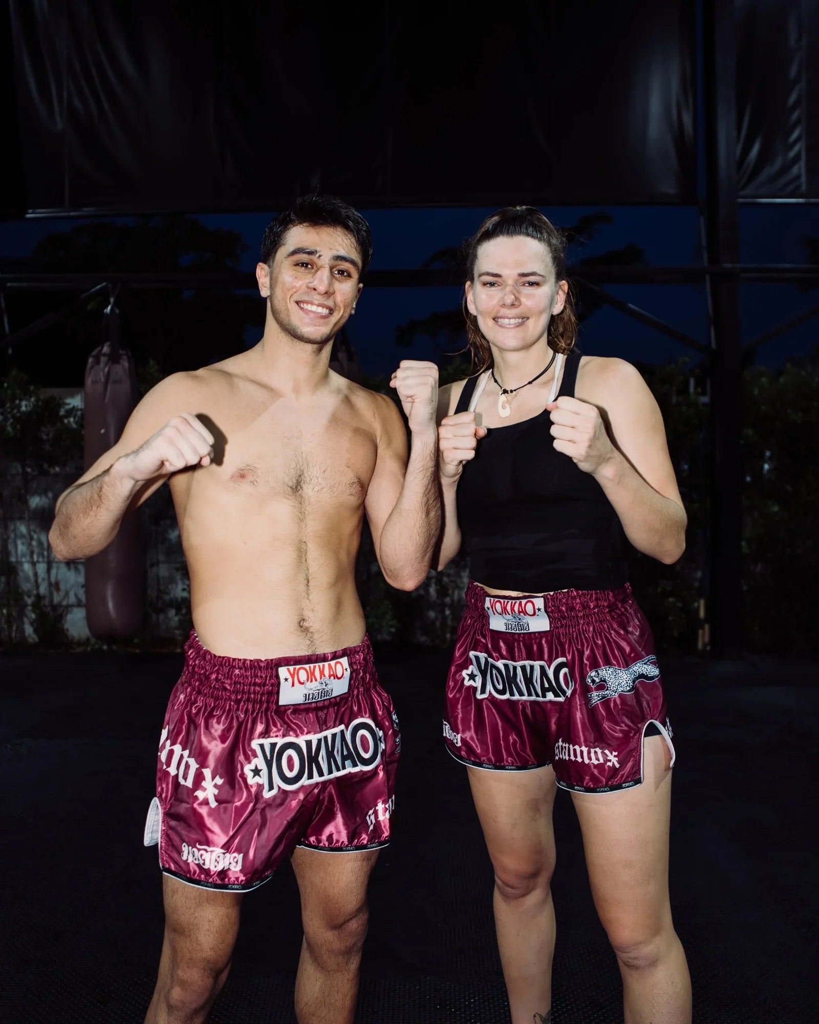 Athletes in boxing stance with Stamox beetroot powder for endurance and recovery