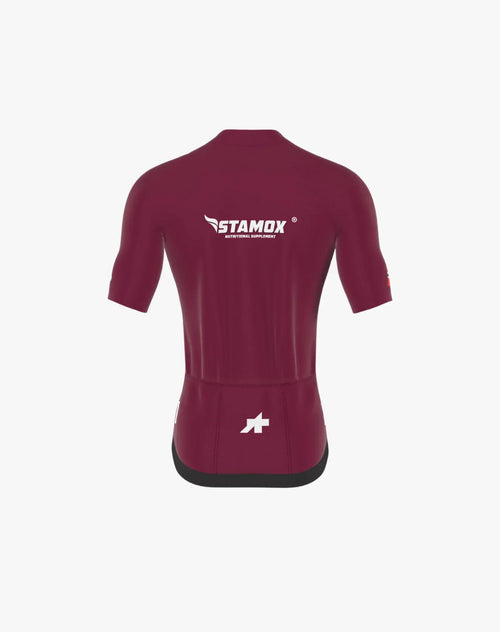 Maroon cycling jersey with Stamox Beetroot Powder logo and branding, rear view.