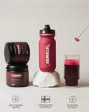 Stamox beetroot powder jars, red water bottle, and glass of mixed drink, fitness supplement