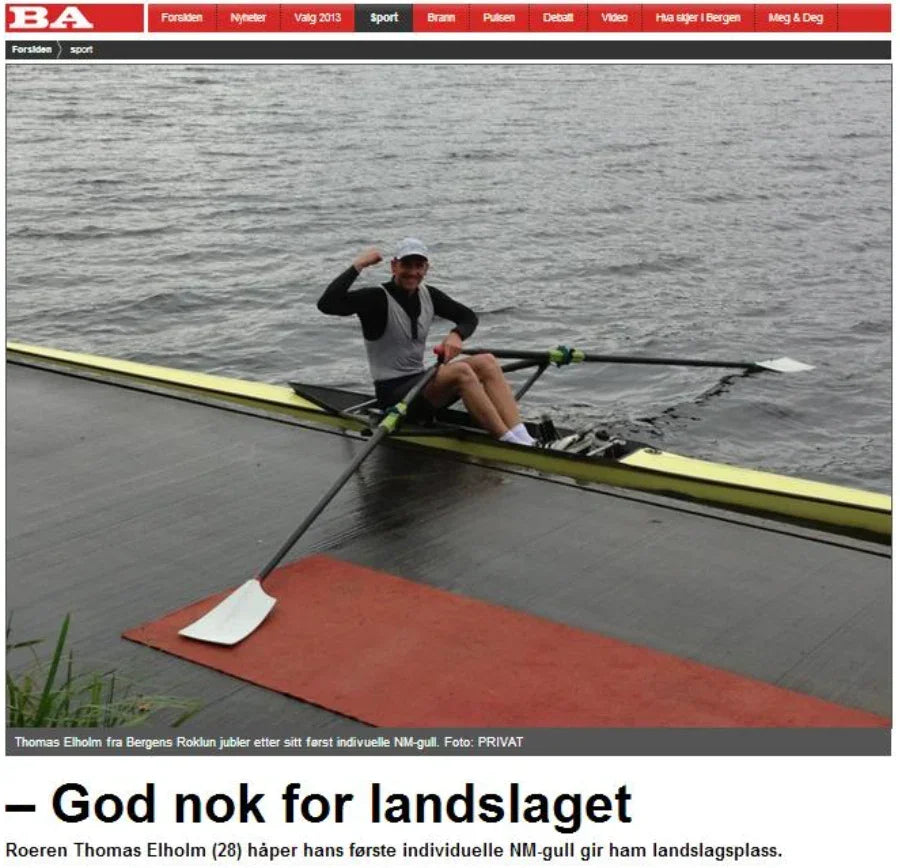 Athlete celebrating in a rowing boat on waterfront, featuring Stamox beetroot powder for endurance