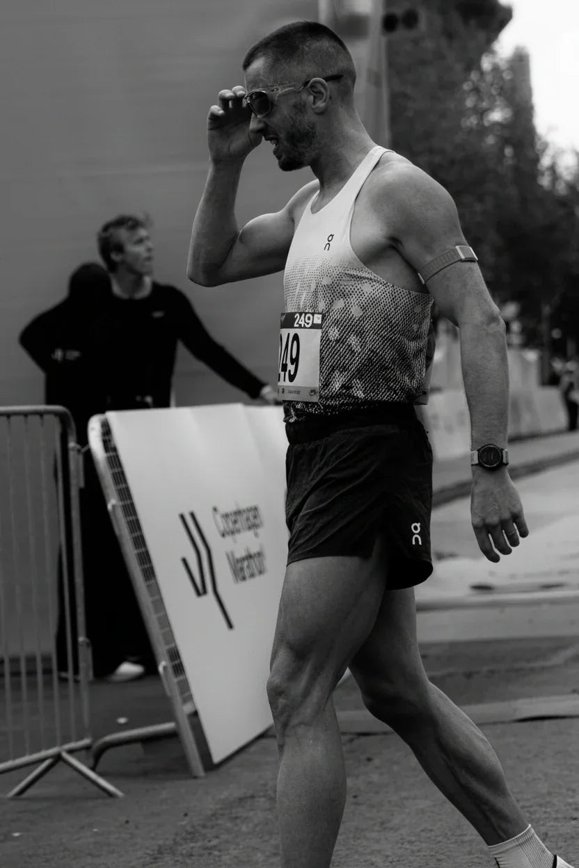 Runner at Copenhagen Marathon wearing race bib 249, showcasing endurance — fueled by Stamox beetroot powder.