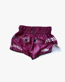 Maroon athletic shorts with stamox beetroot powder branding, sunburst designs, and white accents