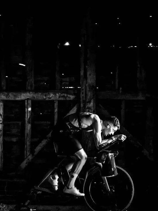 Athlete cycling indoors, showcasing endurance and recovery with stamox beetroot powder benefits