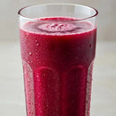 Glass of fresh cold beetroot juice with condensation, stamox beetroot powder drink