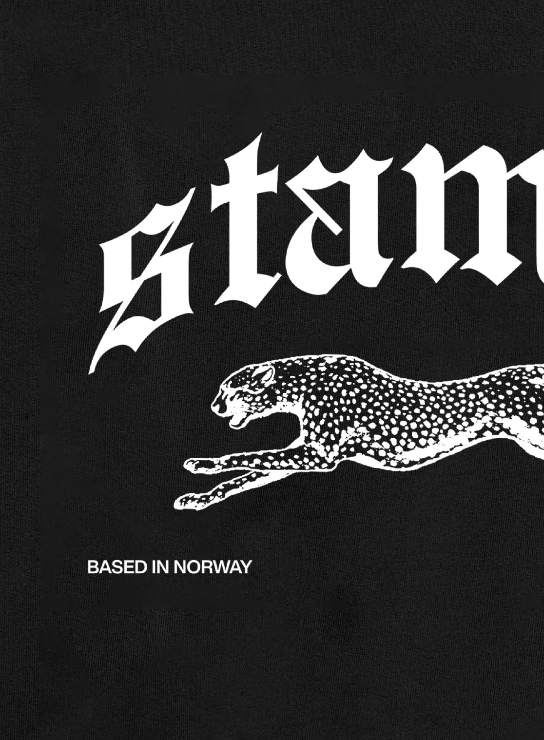 Black t-shirt with white text and panther graphic, 'Stamox' and 'Based in Norway' on a black background.