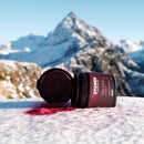 Stamox beetroot sport nutrition Oxy-plus powder for VO2 max on snow with snowy mountains backdrop